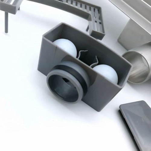 Желоб TIM гориз.выпуск с решеткой под кладку плитки защита от запаха:(сухой +гидрозатвор) 70*1200мм BAD4512002